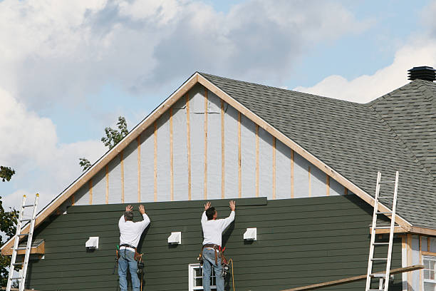 Professional Siding Repair technician working in Thompson, OH